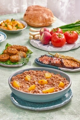 close-up of oriental breakfast, a dish of foul medames, falafel tablets, Arabic breakfast, arab restaurant
