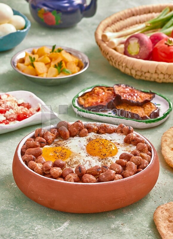 Dish of foul medames with fried egg, Arabic breakfast, oriental breakfast, arab restaurant