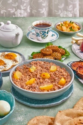 close-up of oriental breakfast, a dish of foul medames, falafel tablets, Arabic breakfast, arab restaurant