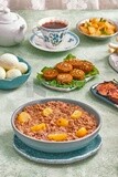 close-up of oriental breakfast, a dish of foul medames, falafel tablets, Arabic breakfast, arab restaurant