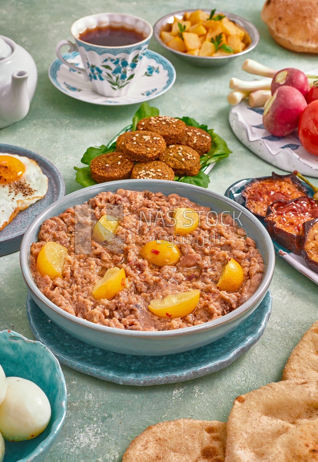 close-up of oriental breakfast, a dish of foul medames, falafel tablets, Arabic breakfast, arab restaurant