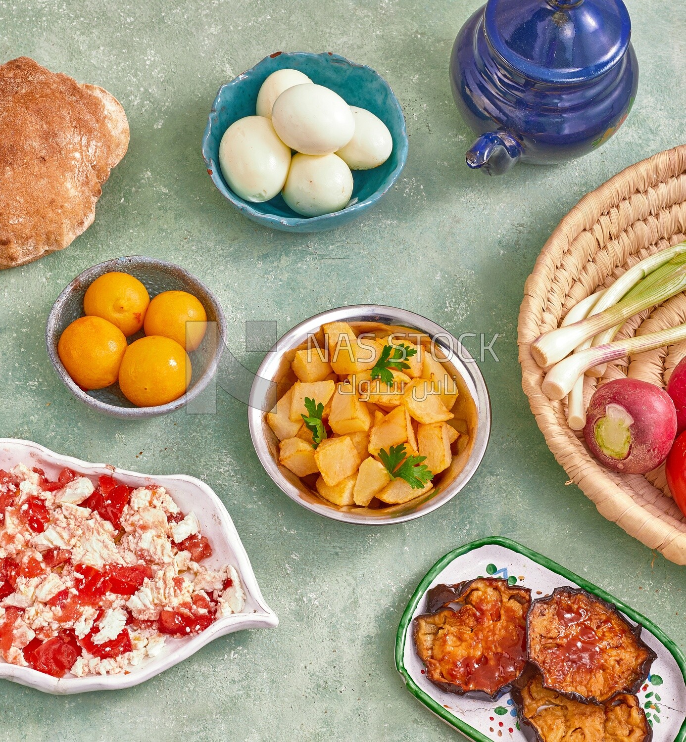 Close-up of oriental breakfast, a dish of cheese with tomato, fried eggplant, Arabic breakfast, arab restaurant