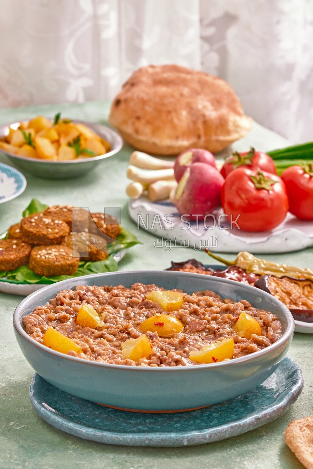 Close-up of oriental breakfast, a dish of foul medames, falafel tablets, Arabic breakfast, arab restaurant