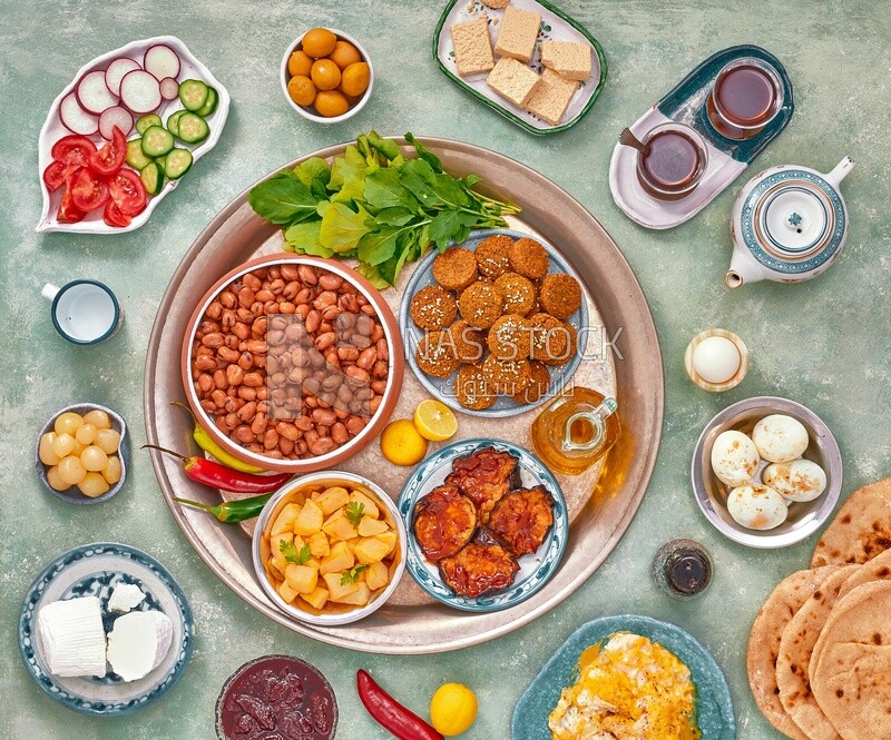 Close-up of oriental breakfast, a dish of foul medames, falafel tablets, Arabic breakfast, arab restaurant