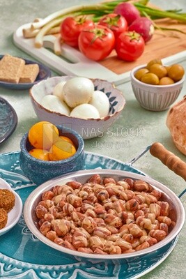 Close-up of oriental breakfast, a dish of foul medames, Arabic breakfast, arab restaurant