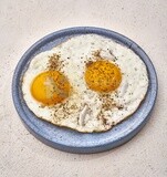 Close-up of a plate of fried egg, Arabic breakfast, oriental breakfast, arab restaurant