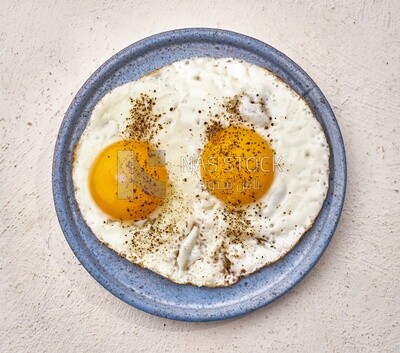Close-up of a plate of fried egg, Arabic breakfast, oriental breakfast, arab restaurant