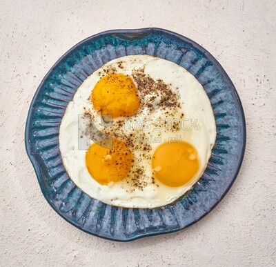 Close-up of a plate of fried egg, Arabic breakfast, oriental breakfast, arab restaurant