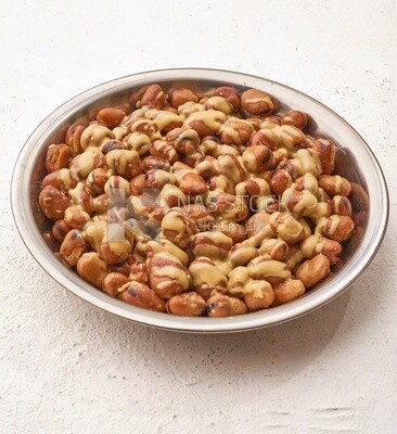 Close-up of oriental breakfast, a dish of foul medames with tahini, Arabic breakfast, arab restaurant