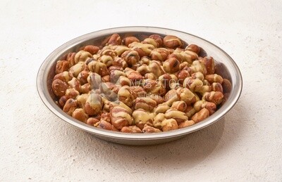 Close-up of oriental breakfast, a dish of foul medames with tahini, Arabic breakfast, arab restaurant