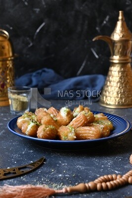 Tulumba with cream in it, eastern sweets, Arabic Restaurant
