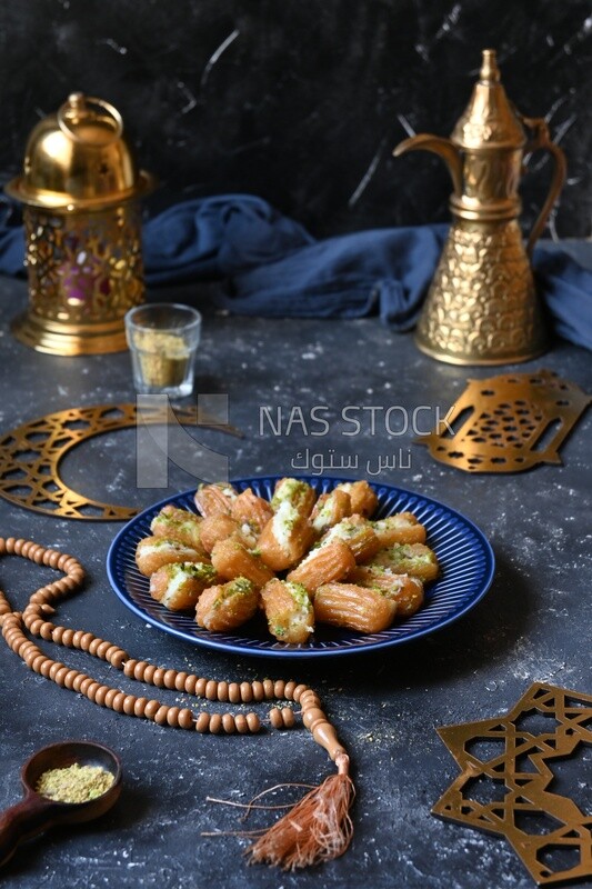 Tulumba with cream in it, eastern sweets, Arabic Restaurant