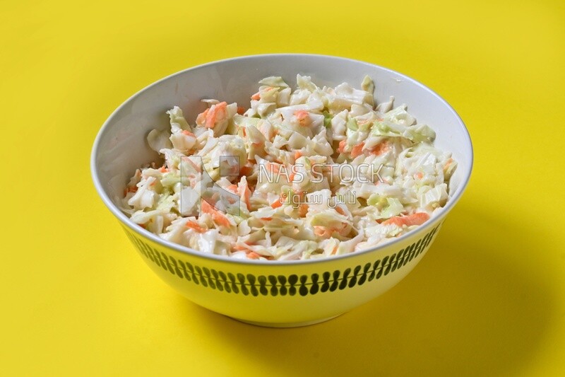 Bowl of Coleslaw, cold appetizers, Arabic dishes, oriental foods