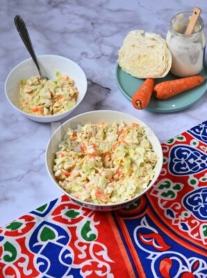 Bowl of Coleslaw beside the ingredients​ of it, cold appetizers, Arabic dishes, oriental foods