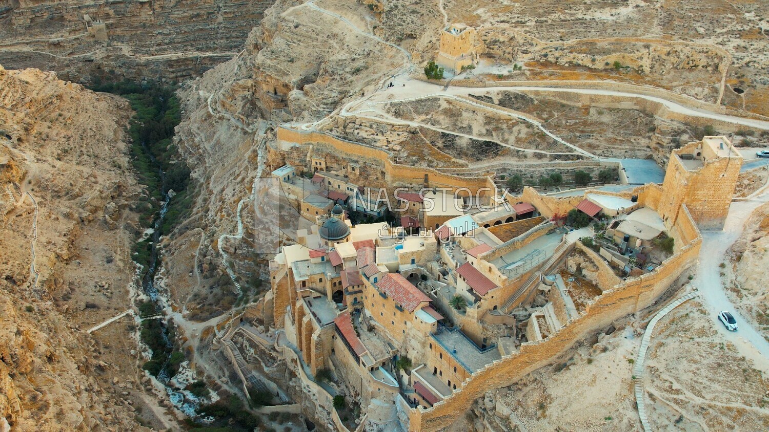 drone footage of the Mar Saba monastery in the desert, tourism in Palestine,  Bethlehem