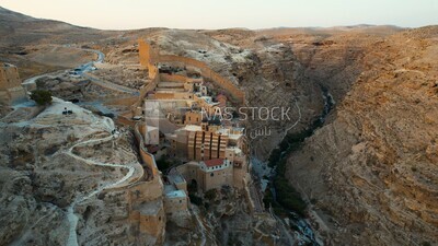 drone footage of the Mar Saba monastery in the desert, tourism in Palestine,  Bethlehem