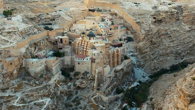 drone footage of the Mar Saba monastery in the desert, tourism in Palestine,  Bethlehem