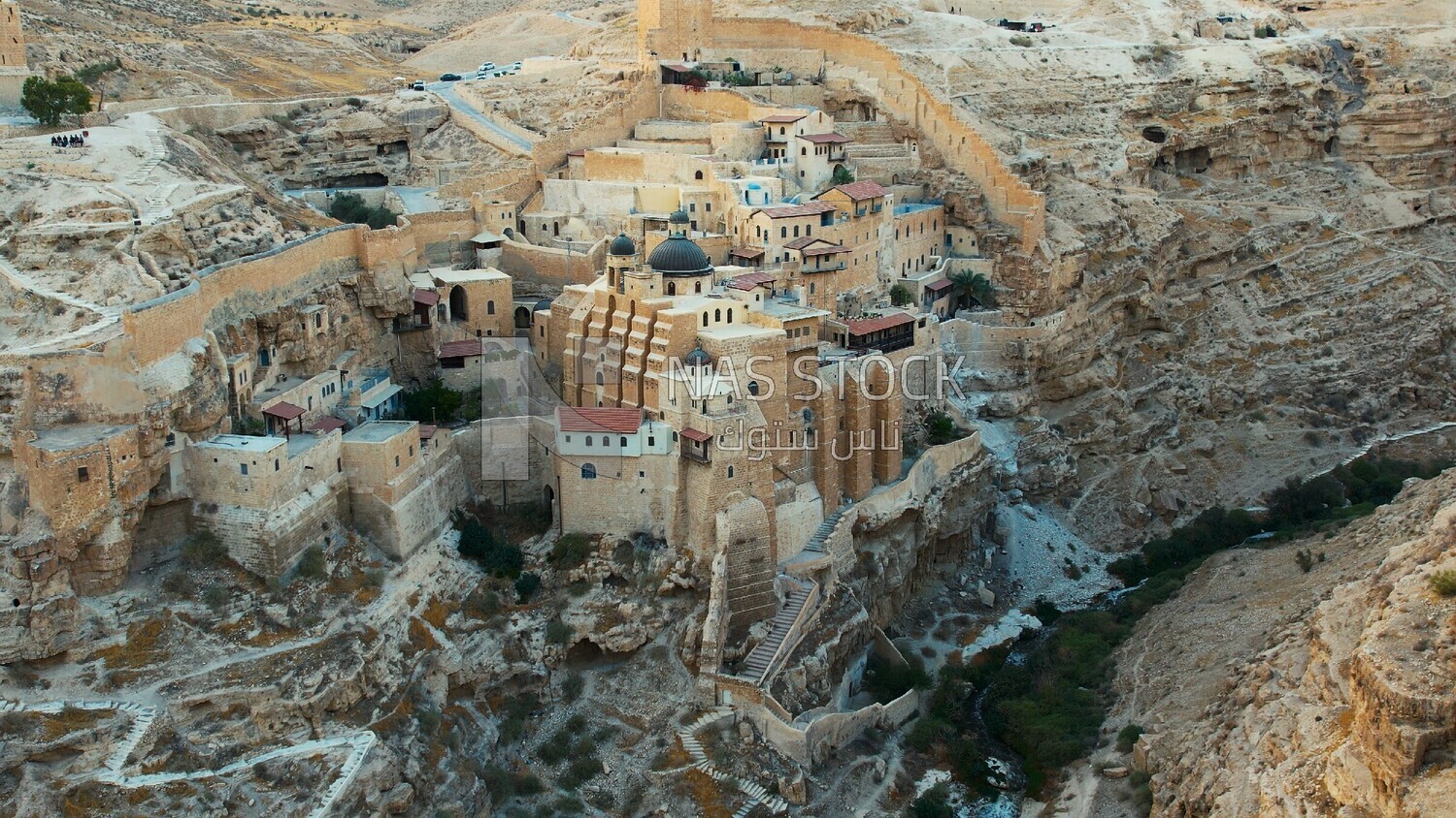 drone footage of the Mar Saba monastery in the desert, tourism in Palestine,  Bethlehem