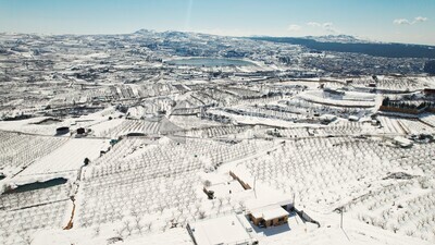 Drone footage of the Golan Heights landscape on a snowy day, tourism in Palestine, landscape