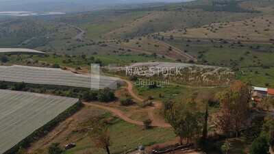 drone footage of a distant view of the Tiberias Church of the Beatitudes,  tourism in Palestine,  Bethlehem