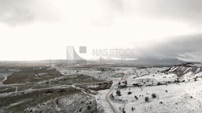 Drone footage of the Majdal Shams village on a snowy day, landscape waterfall, tourism in Palestine