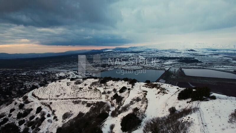 Drone footage of the Golan Heights landscape on a snowy day, tourism in ...