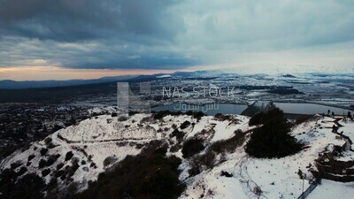 Drone footage of the Golan Heights landscape on a snowy day, tourism in Palestine, landscape