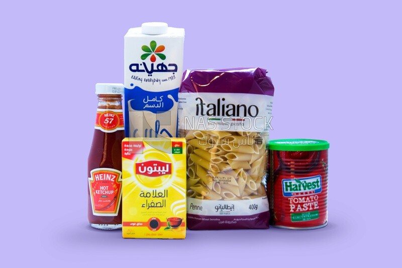 Different food products, pasta white sauce, red sauce, milk