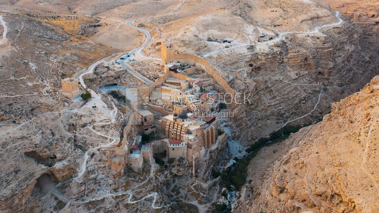 drone footage of the Mar Saba monastery in the desert, tourism in Palestine,  Bethlehem