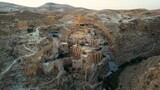 drone footage of the Mar Saba monastery in the desert, tourism in Palestine,  Bethlehem