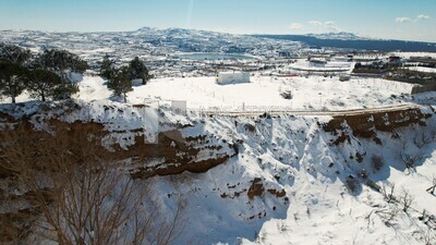 Drone footage of the Golan Heights landscape on a snowy day, tourism in Palestine, landscape