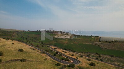 drone footage of a distant view of the Tiberias Church of the Beatitudes,  tourism in Palestine,  Bethlehem