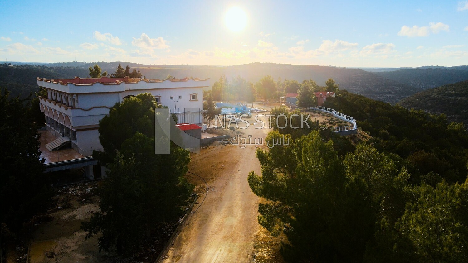 drone footage of a house with a swimming pool in Libya, history of Libya, landmarks in Libya