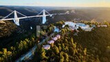 drone footage shows the Wadi Alkouf Bridge from away, Libya, history of Libya, landmarks in Libya