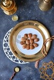 Plate of Remosh El Set with nuts, oriental Arabic sweets, Ramadan sweets