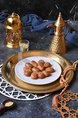 Plate of Remosh El Set with nuts, oriental Arabic sweets, Ramadan sweets