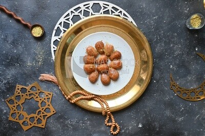 Plate of Remosh El Set with nuts, oriental Arabic sweets, Ramadan sweets