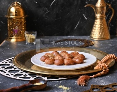 Plate of Remosh El Set with nuts, oriental Arabic sweets, Ramadan sweets