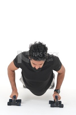 Saudi man doing warm-up exercises