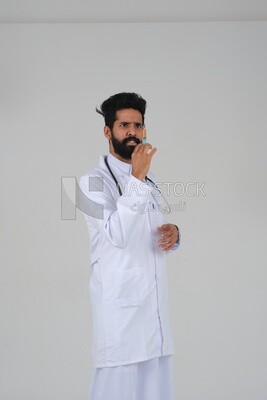 Saudi man wearing a medical coat and a stethoscope, holding a medical needle, white background, medicine and health care, Saudi model