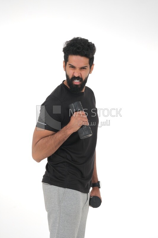 Saudi man Wearing sports clothes, exercising with dumbbells, bodybuilding, healthy lifestyle, building muscle, white background, Saudi model