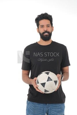 Saudi man holding a ball, playing football,  practicing soccer sports, playing with the ball, white background, Saudi model