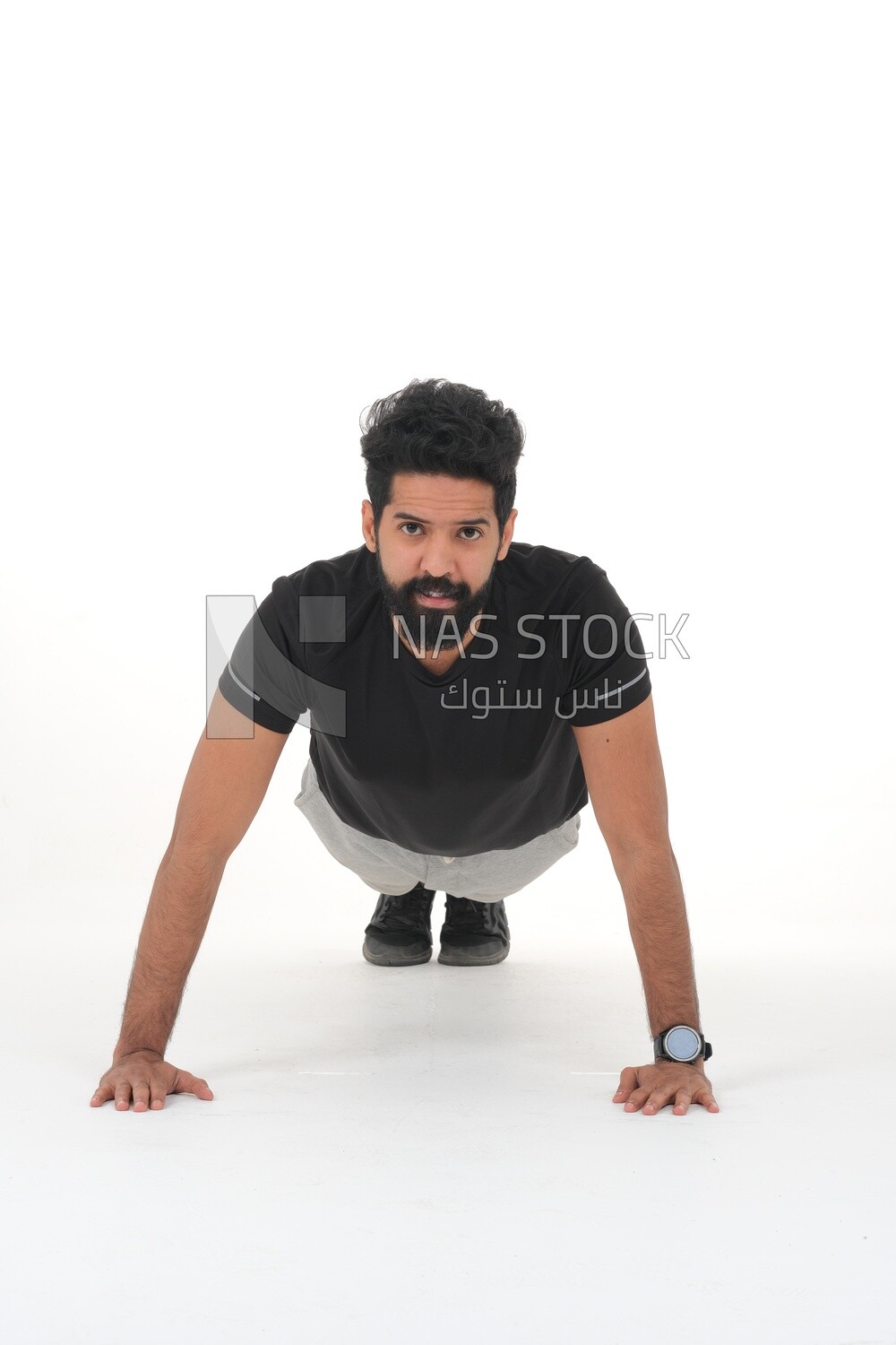 Saudi man doing warm-up exercises, push-ups, bodybuilding, healthy lifestyle, building muscle, white background, Saudi model