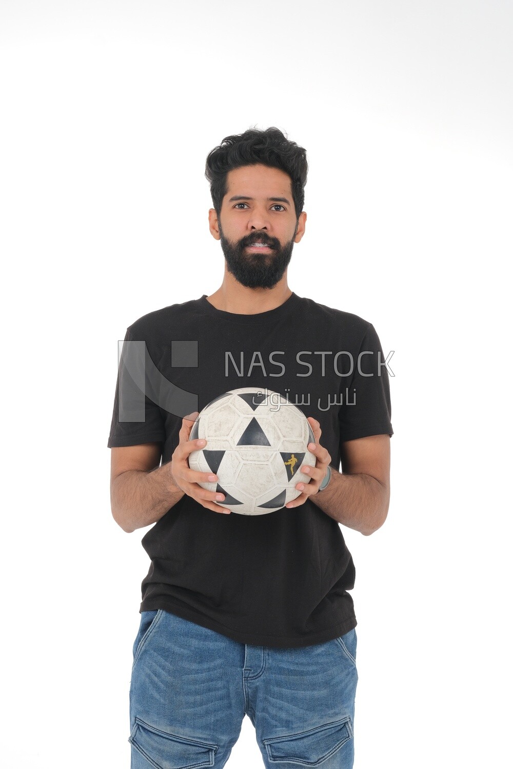 Saudi man holding a ball