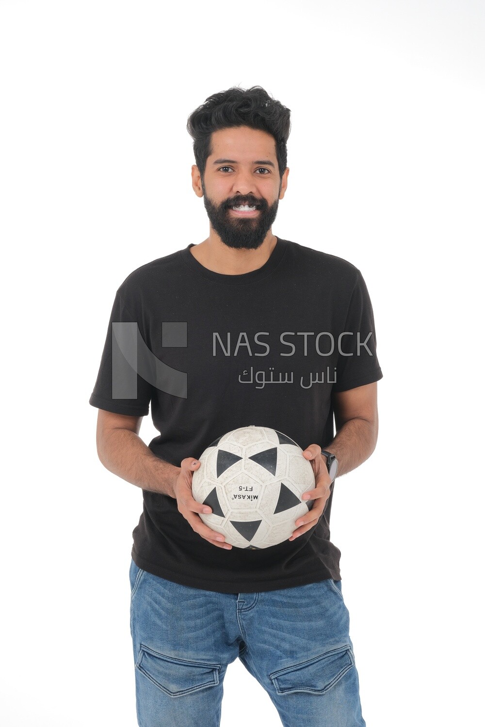 Saudi man holding a ball, playing football,  practicing soccer sports, playing with the ball, white background, Saudi model