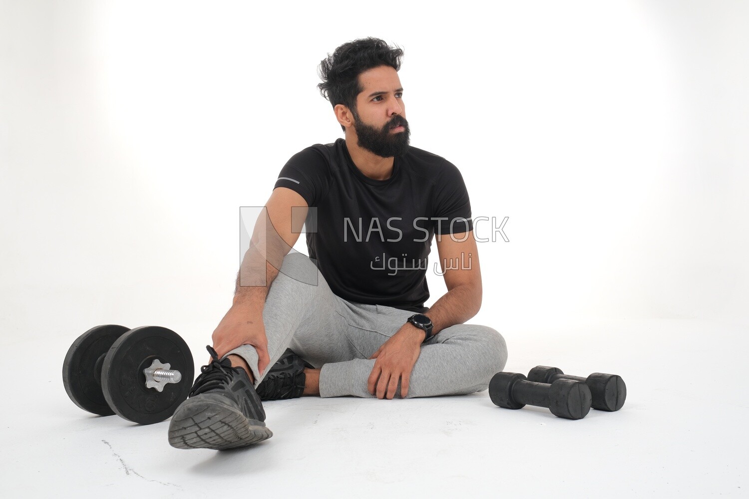 Saudi man doing warm-up exercises, push-ups, bodybuilding, healthy lifestyle, building muscle, white background, Saudi model