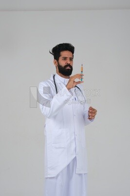 Saudi man wearing a medical coat and a stethoscope, holding a medical needle, white background, medicine and health care, Saudi model