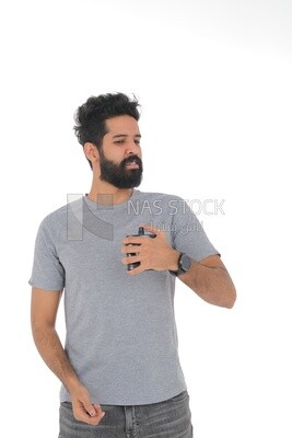 Saudi man holding a perfume bottle, applying perfume, selfcare, skin care and hygiene, Saudi model, white background