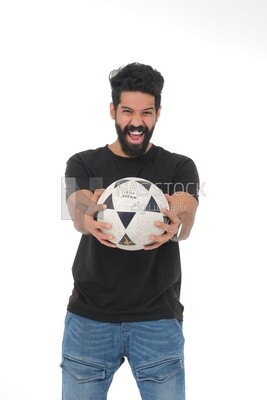 Saudi man holding a ball, playing football,  practicing soccer sports, playing with the ball, white background, Saudi model