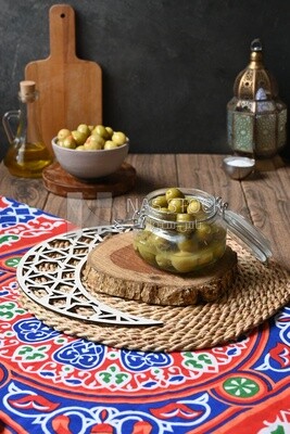 Bowl of Pickled green olives, Egyptian pickles, Arab restaurants